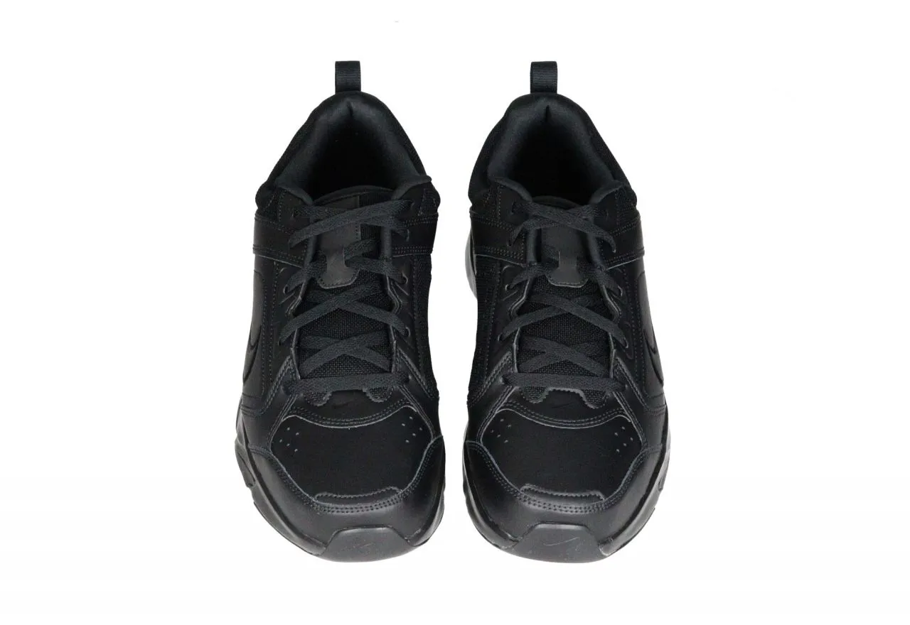 Sneaker Negro Liso Cuello y Un Lateral Rejilla Piso Goma